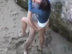 On the beach, this woman is undoubtedly enjoying herself with her boyfriend.